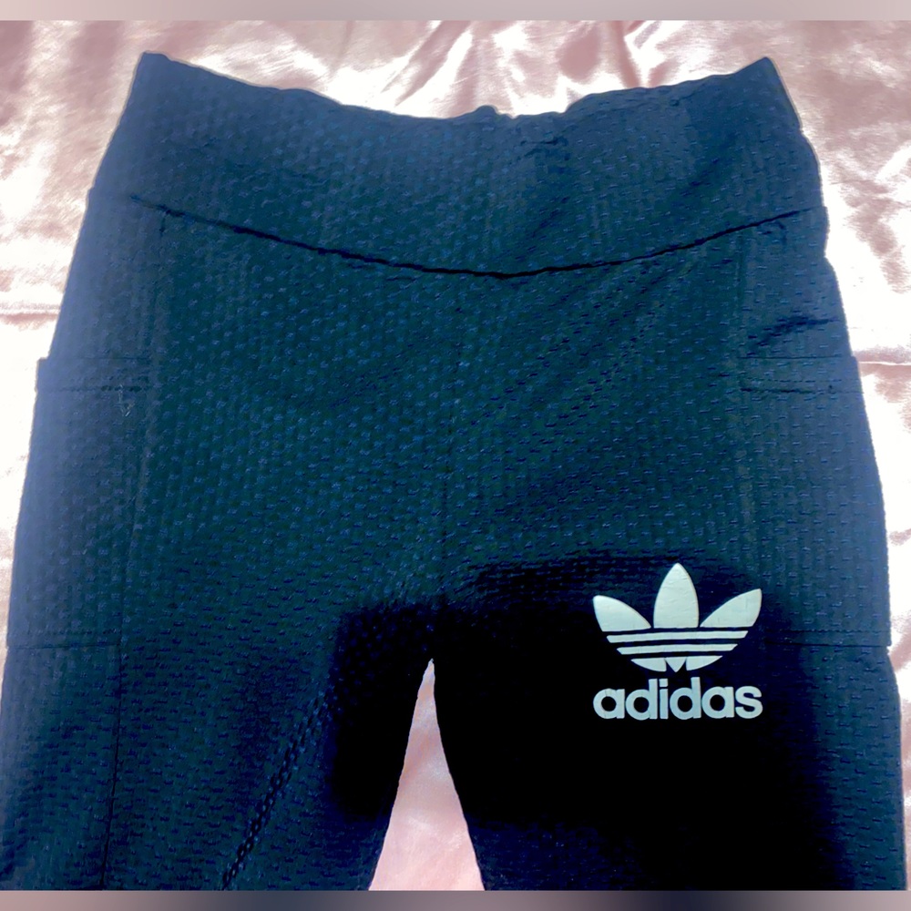 Black adidas print logo scrunched butt leggings.